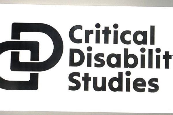 Black and white logo for Critical Disability Studies at Sheffield University. It says the words Critical Disability Studies next to two interlinked capital letter Ds